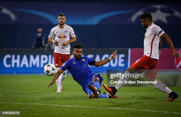 El Arabi Hilal Soudani of Dinamo Zagreb in action against Wanderson of Salzburg during the UEFA Champions League Play-offs First leg match between...