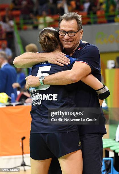 Camille Ayglon Saurina and Olivier Krumbholz coach of France celebrates during the match between France and Spain in the female handball tournament...