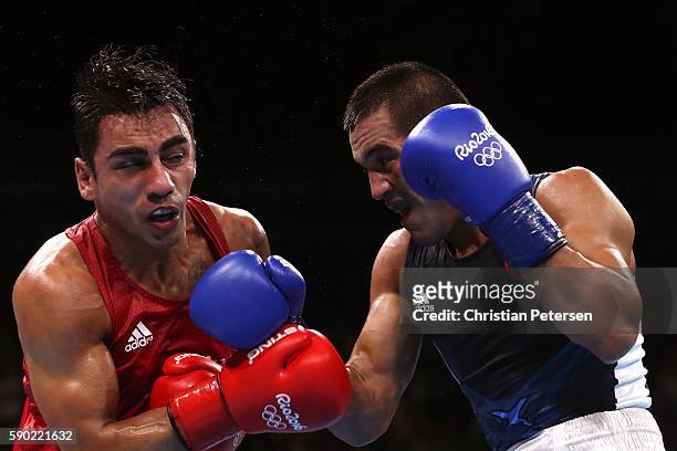 Artem Harutyunyan of Germany fights against Batuhan Gozgec of Turkey during the Men's Light Welter Quarterfinal 3 on Day 11 of the Rio 2016 Olympic...