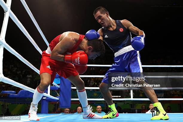 Artem Harutyunyan of Germany fights against Batuhan Gozgec of Turkey during the Men's Light Welter Quarterfinal 3 on Day 11 of the Rio 2016 Olympic...