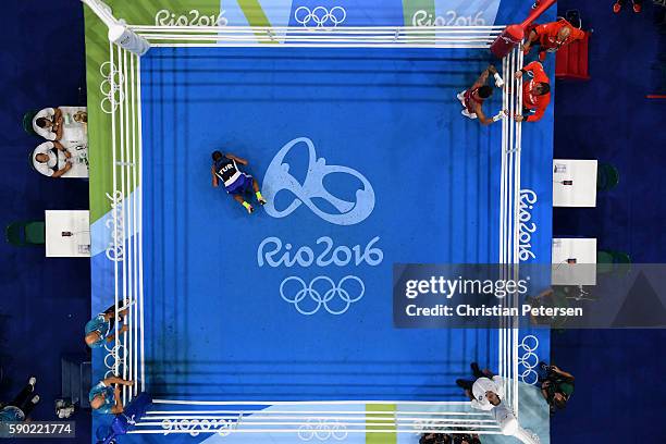 Artem Harutyunyan of Germany celebrates after defeating Batuhan Gozgec of Turkey in the Men's Light Welter Quarterfinal 3 on Day 11 of the Rio 2016...