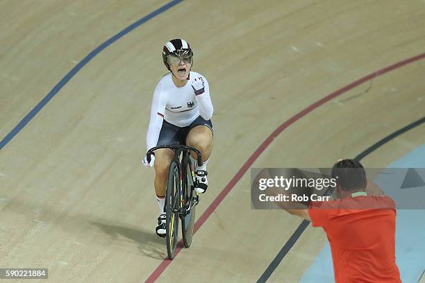 Kristina Vogel of Germany celebrates after winning gold during the Women's Sprint Finals gold medal race against Rebecca James of Great Britain on...