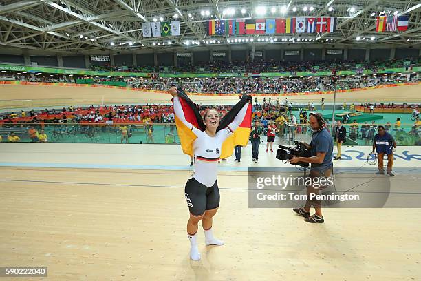 Kristina Vogel of Germany celebrates after winning gold during the Women's Sprint Finals gold medal race against Rebecca James of Great Britain on...