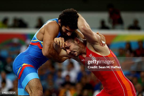 Davor Stefanek of Serbia competes against Migran Arutyunyan of Armenia in the Men's Greco-Roman 66 kg Gold Medal bout on Day 11 of the Rio 2016...