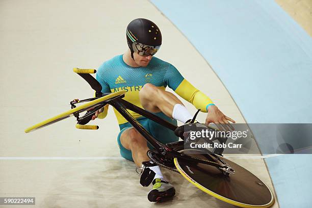 Matthew Glaetzer of Australia crashes around a turn during the Men's Keirin Finals race on Day 11 of the Rio 2016 Olympic Games at the Rio Olympic...
