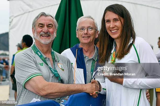 Rio , Brazil - 16 August 2016; Annalise Murphy of Ireland with Kieran Mulvey, left, Chairman, Sport Ireland and John Treacy, CEO, Sport Ireland,...