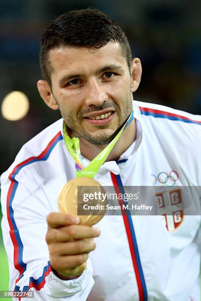 Davor Stefanek of Serbia poses with the gold medal for the Men's Greco-Roman 66 kg final on Day 11 of the Rio 2016 Olympic Games at Carioca Arena 2...