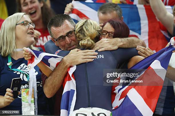 Laura Trott of Great Britain celebrates with the crowd after winning gold in the women's Omnium Points race on Day 11 of the Rio 2016 Olympic Games...