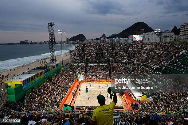 General view of the action between Alexander Brouwer and Robert Meeuwsen of Netherlands and Alison Cerutti and Bruno Oscar Schmidt of Brazil during...