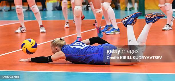 Russia's Anna Malova in action during the women's quarter-final volleyball match between Russia and Serbia at the Maracanazinho stadium in Rio de...