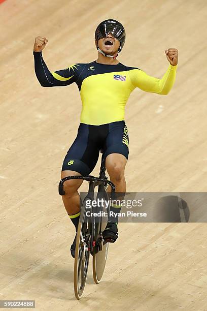 Azizulhasni Awang of Malaysia celebrates winning bronze during the Men's Keirin Finals race on Day 11 of the Rio 2016 Olympic Games at the Rio...