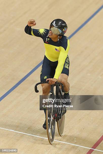 Azizulhasni Awang of Malaysia celebrates winning bronze during the Men's Keirin Finals race on Day 11 of the Rio 2016 Olympic Games at the Rio...