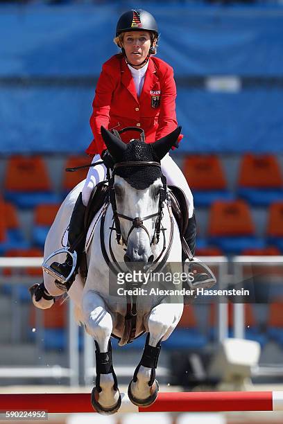 Meredith Michaels-Beerbaum of Germany rides Fibonacci during the Team Jumping on Day 11 of the Rio 2016 Olympic Games at the Olympic Equestrian...