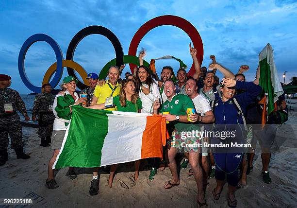 Rio , Brazil - 16 August 2016; Annalise Murphy of Ireland celebrates with family and friends after winning a silver medal in the Women's Laser Radial...