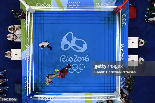 Efe Ajagba of Nigeria fights against Ivan Dychko of Kazakhstan during the Men's Super Heavy Quarterfinal 4 on Day 11 of the Rio 2016 Olympic Games at...