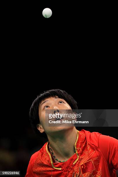 Xiaoxia Li of China plays a match against Ying Han of Germany in the Women's Team Gold Medal Team Match between China and Germany on Day 11 of the...
