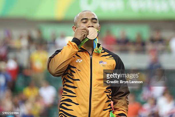 Bronze medalist Azizulhasni Awang of Malaysia celebrates during the medal ceremony after the Men's Keirin Finals race on Day 11 of the Rio 2016...