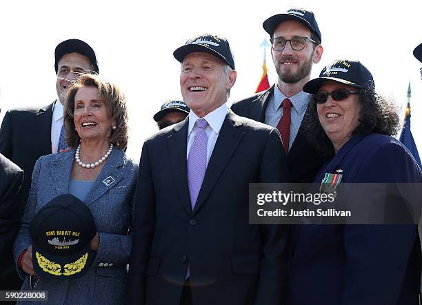 Stuart Mik, U.S. Rep Nancy Pelosi U.S. Secretary of the Navy Ray Mabus, Scott Wiener and Paula Neira pose for a photo during a ship naming ceremony...