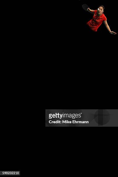 Shiwen Liu of China plays a match against Petrissa Solja of Germany in the Women's Team Gold Medal Team Match between China and Germany on Day 11 of...