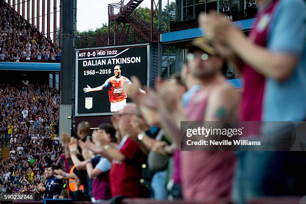 Minutes applause for held for former player Dalian Atkinson during the Sky Bet Championship match between Aston Villa and Huddersfield Town at Villa...