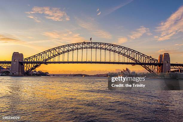 two sydney icons - sydney harbour bridge stockfoto's en -beelden