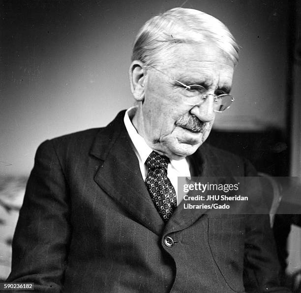 Candid sitting portrait of American philosopher, psychologist, and educational reformer John Dewey, 1946. .