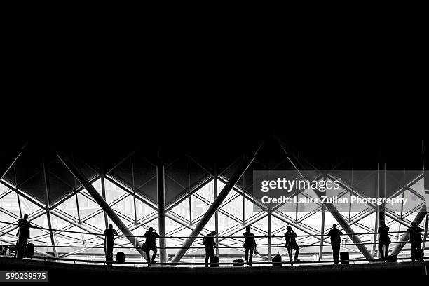 waiting at kings cross station - laura zulian stock pictures, royalty-free photos & images