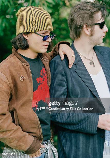 American actor Johnny Depp poses with Irish singer Shane MacGowan, frontman of the Pogues, UK, 3rd October 1994.