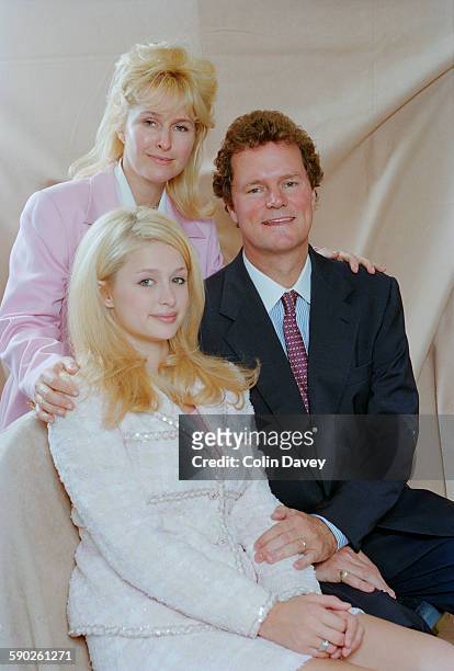 American socialite and television personality Paris Hilton with her parents, Kathy and Richard Hilton, 5th July 1996.