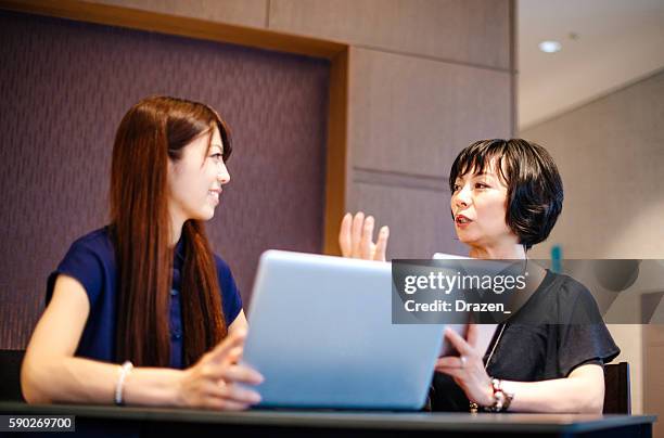 young employee with company manager at interview - government employee stock pictures, royalty-free photos & images