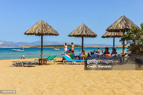 beautiful beach and tropical water - paros, greece - porous stock pictures, royalty-free photos & images