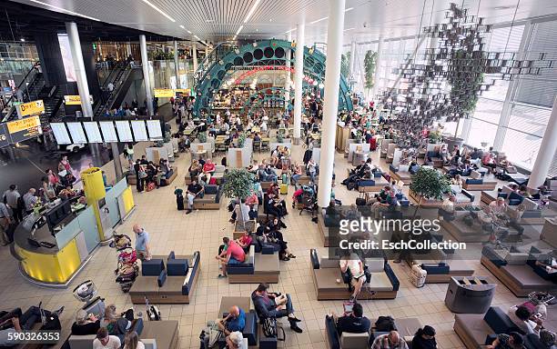 schiphol airport departure lounge, amsterdam - amsterdam airport stock pictures, royalty-free photos & images