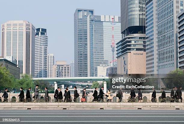 morning commute at the heart of osaka, japan - osaka city stock pictures, royalty-free photos & images