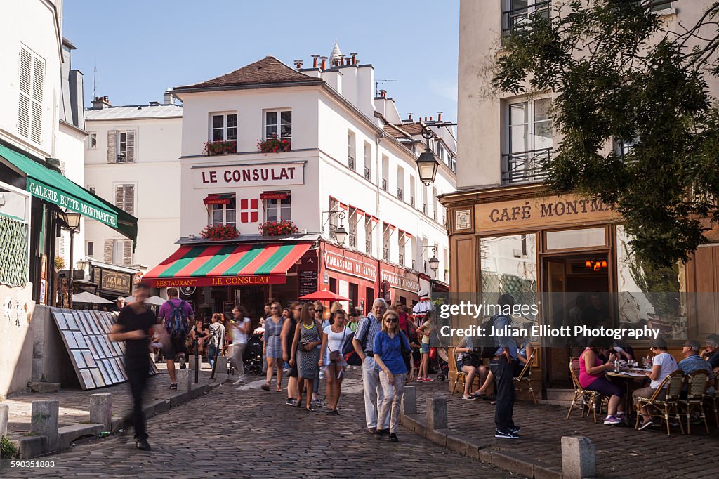 The bustling streets of Montmartre in Paris.