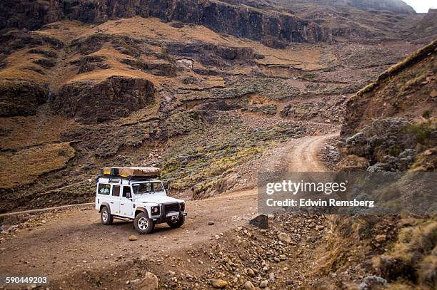 manuevering the sani pass - terrain stock pictures, royalty-free photos & images