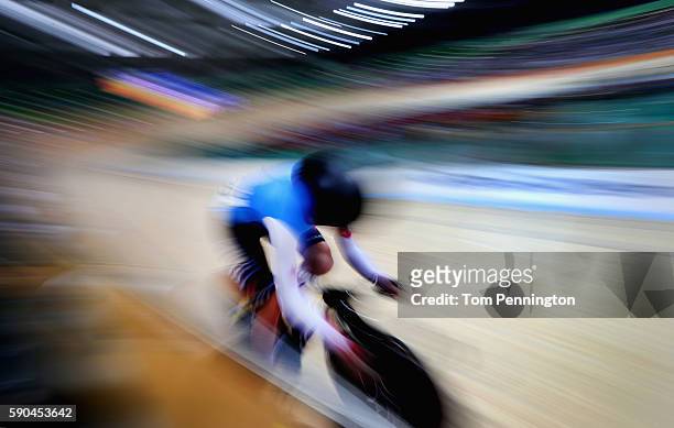 Allison Beveridge of Canada is given a start by a coach during the Women's Omnium Flying Lap 5\6 race on Day 11 of the Rio 2016 Olympic Games at the...