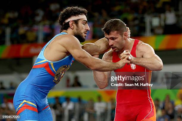 Migran Arutyunyan of Armenia competes against Davor Stefanek of Serbia in the Men's Greco-Roman 66 kg Gold Medal bout on Day 11 of the Rio 2016...