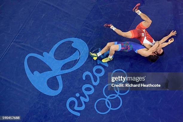 Rasul Chunayev of Azerbaijan competes against Hansu Ryu of Korea in the Men's Greco-Roman 66 kg Bronze final bout on Day 11 of the Rio 2016 Olympic...