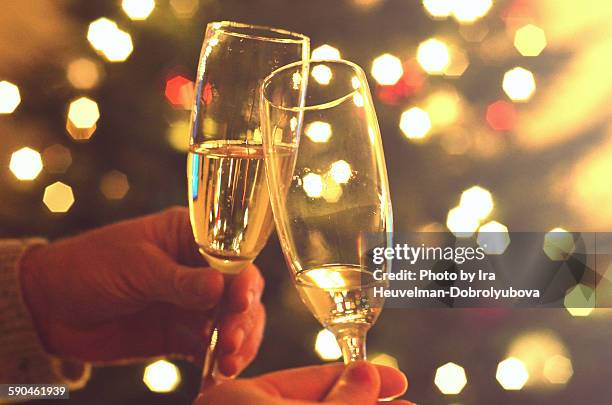 glasses of champagne - champagne toast stock-fotos und bilder