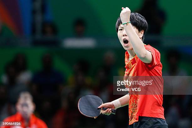 Li Xiaoxia of China competes against Han Ying of Germany in the Women's Team Gold Medal Team Match between China and Germany on Day 11 of the Rio...