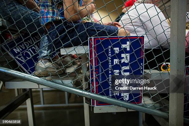 Trump supporters wait to hear Republican presidential nominee Donald Trump speak at a rally on August 16, 2016 in West Bend, Wisconsin.