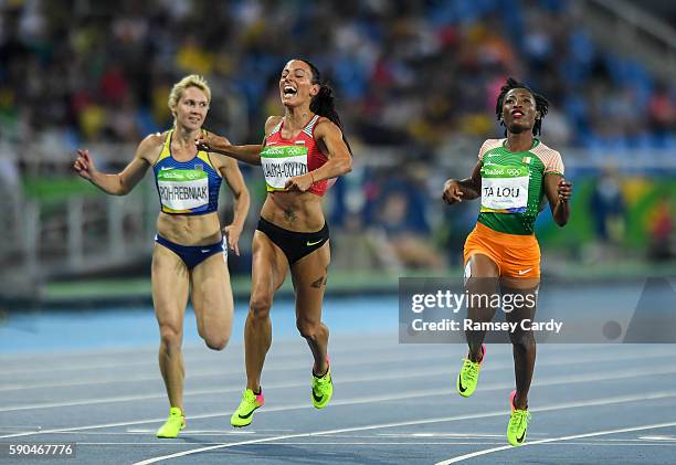 Rio , Brazil - 16 August 2016; Race winner Marie-Josee Talou, right, of Ivory Coast and second placed Ivet Lalova-Collio of Bulgaria following the...