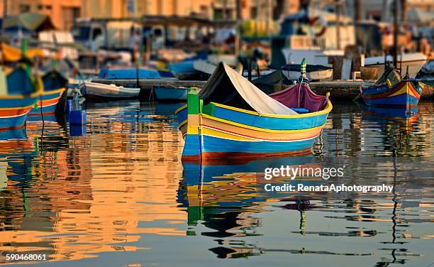 maltese fishing boats, marsaxlokk, malta - marsaxlokk stockfoto's en -beelden