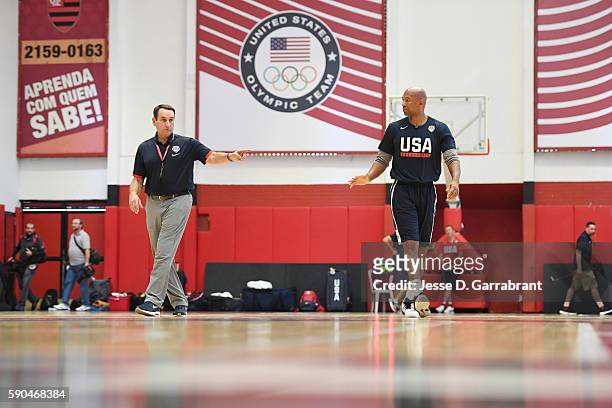 Head coach Mike Krzyzewski talks to assistant coach Monty Williams of the USA Basketball Men's National Team at a practice during the Rio 2016...
