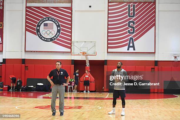 Head coach Mike Krzyzewski talks to Kyrie Irving of the USA Basketball Men's National Team at a practice during the Rio 2016 Olympic Games on August...