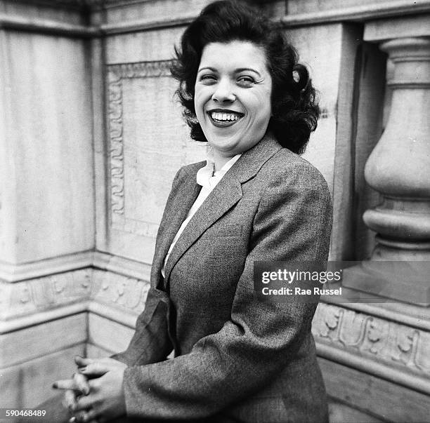 Portrait of Hanna Stein as she poses outside the New York Public Library , New York, New York, 1944.