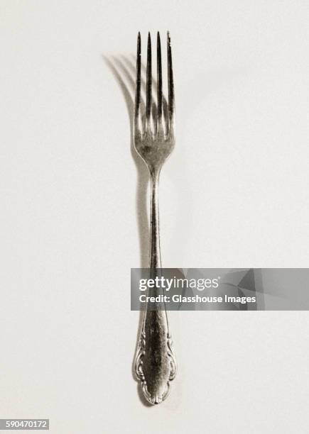 silver fork on white background - gaffel bildbanksfoton och bilder