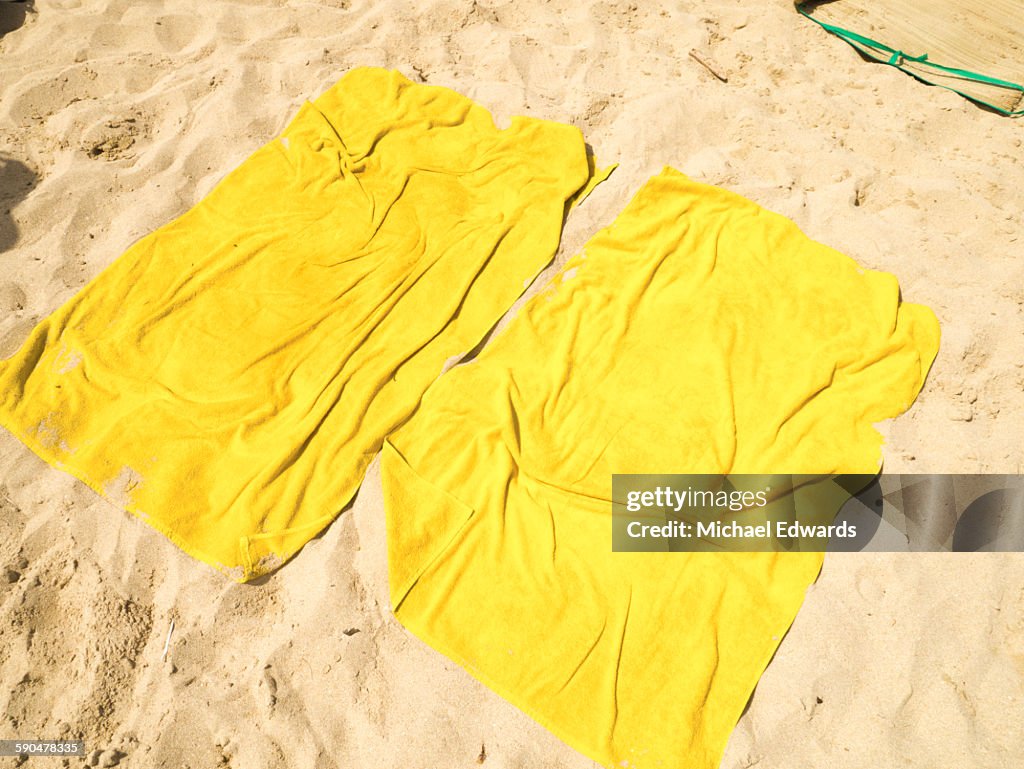 Two towels on the beach