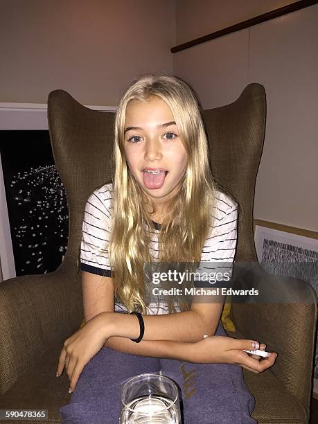 portrait of 12 year old girl - blonde girl sticking out her tongue stock pictures, royalty-free photos & images