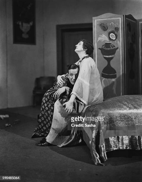 English actors Noel Coward and Lilian Braithwaite in a scene from Coward's, 'The Vortex', at the Everyman Theatre in Hampstead, London, 1924. The...